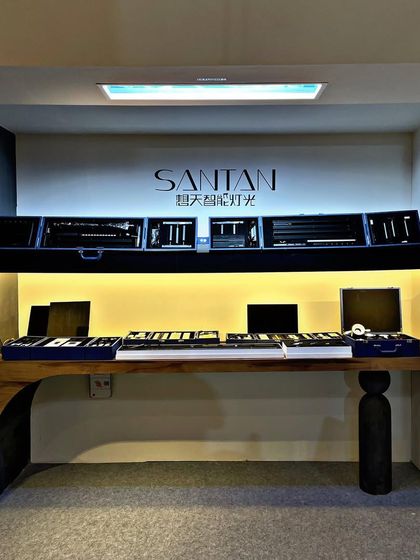 Another angle of the Santan lighting display table. The clean layout and focused lighting allow architects and designers to closely examine the quality and features of each product.