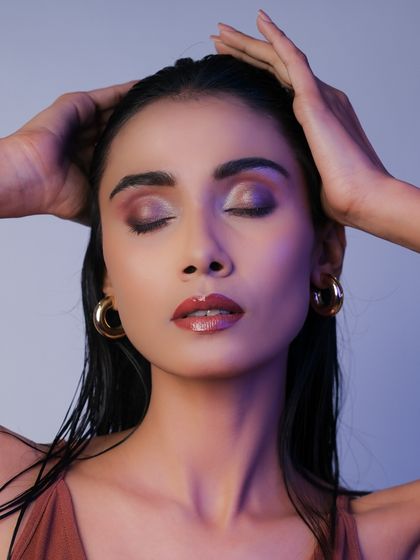 A creative pose that showcases the beautiful blend of colors on the eyelid. My classes foster an environment of artistic exploration.