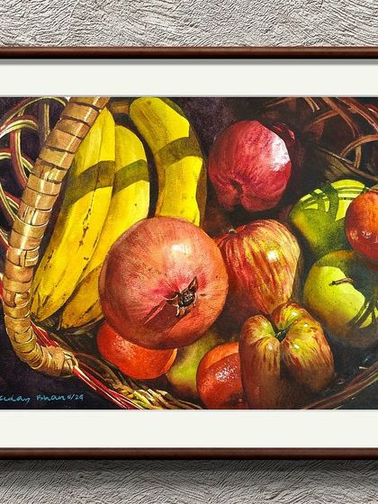 The fruit basket painting, shown in a digital frame.