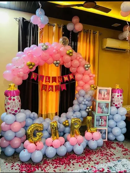 Here is a complete welcome home package for a baby girl. It includes a circular balloon arch, 'GIRL' foil letters, 'BABY' blocks, and themed foil balloons, all in a pink and grey color scheme.