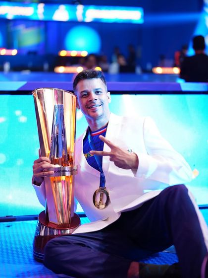 A moment of gratitude and reflection with the championship trophy. This victory is not just a win, but a validation of our high-performance philosophy and relentless pursuit of excellence.