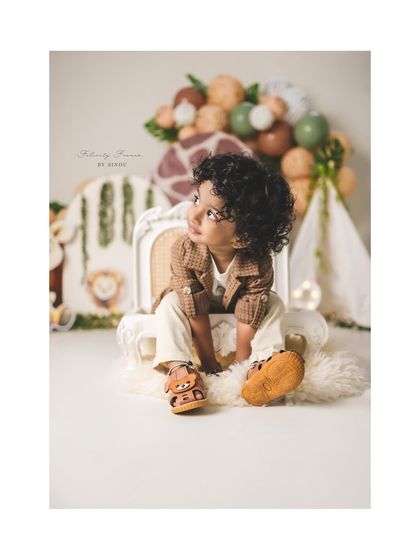 A thoughtful look from this two-year-old during his safari-themed birthday session.