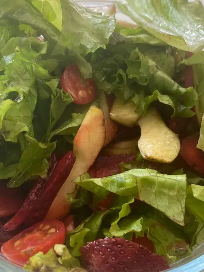 We love getting creative with our healthy salads. This refreshing mix includes crisp lettuce, sweet apple slices, and beetroot, offering a unique combination of flavors and nutrients.