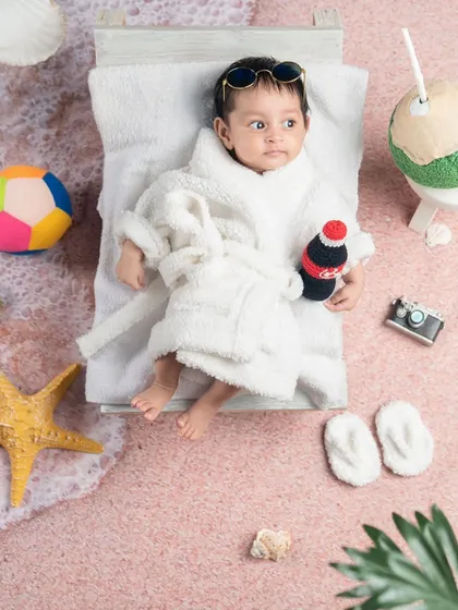 Wide awake and ready to chill. This little one is enjoying his beach vacation.