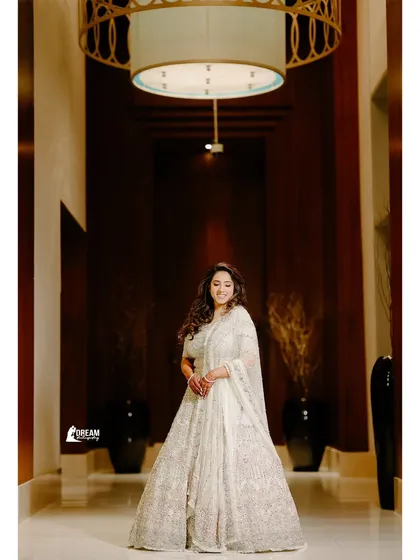 Bride Paavni looking radiant in her white gown during her Sagan and Cocktail night in Dubai.