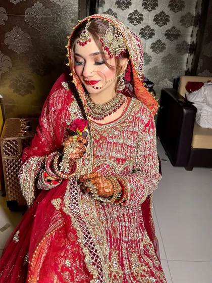 A candid moment with my Nikah bride. This photo captures the soft, romantic feel of the makeup, with glowing skin and beautifully defined eyes.