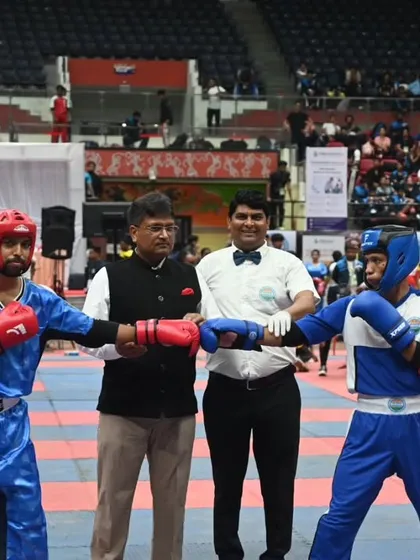 Two fighters show sportsmanship before a bout at the Senior Nationals. Respect for the opponent and the sport is a core tenet we instill in all our athletes.