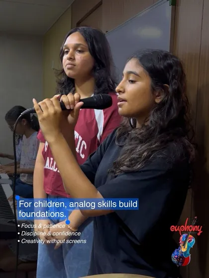 In a world full of screens, I believe in the power of analog skills. This photo shows students deeply focused during a vocal session, building patience and discipline. Learning music is a hands-on activity that helps children connect with themselves and others.