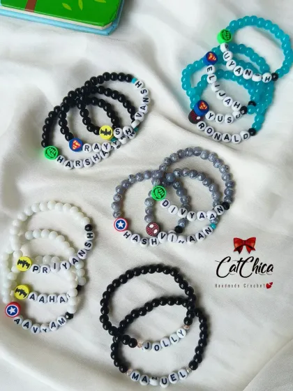 We have something for the boys too! Our custom beaded name bracelets come with cool superhero and smiley charms, making them the perfect birthday return favor.