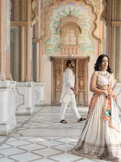 For the couple that dreams of fairytales. Here, against the stunning, hand-painted architecture of Jaipur, we created a moment of regal elegance. This shot shows how I blend your story with the grandeur of a destination, creating timeless, royal pre-wedding portraits.