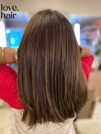 Another angle of the straight mushroom brown balayage, showing off the clean lines of the cut and the subtle, cool-toned highlights.