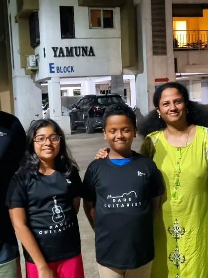 **Always a Delight to Meet Students.** Rishon (Keyboard and Vocals) and Varsha (Guitar) dropped by with their mothers. Both have been with us for over two years and are well on their way to becoming fine performers.