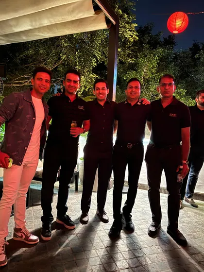 A group of friends at the evening celebration.