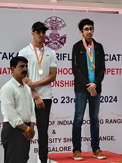 Satvik on the podium after winning two Gold medals in the 25m Standard Pistol event at the state competition.