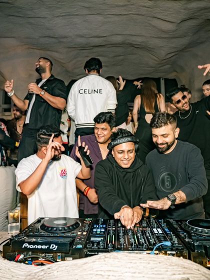 A group of friends having the time of their lives at Bastian. It's all about creating shared memories.