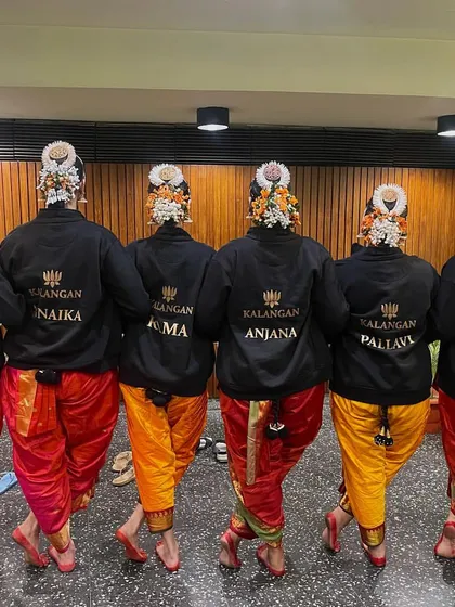 Our custom Kalangan jackets, a symbol of our unity and identity as a dance family. This is a fun tradition we have, celebrating our togetherness after pouring our hearts out on stage.