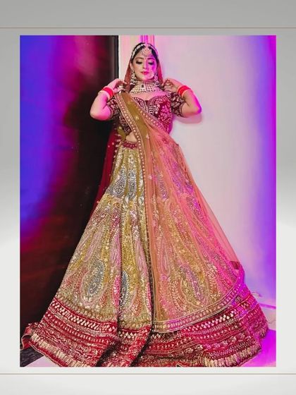 A bride's dream woven in threads of love. This multi-colored lehenga with a red border is a work of art.