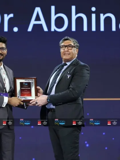 A closer look at the award presentation at the Doctor's Day Conclave. Being recognized among the top 20 dermatologists in the country fuels my passion for advancing skin health and patient care.