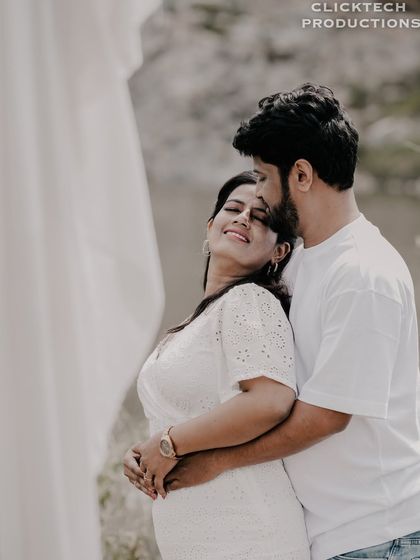 A tender and peaceful embrace from behind, with the bride smiling, captured in a soft and romantic style.