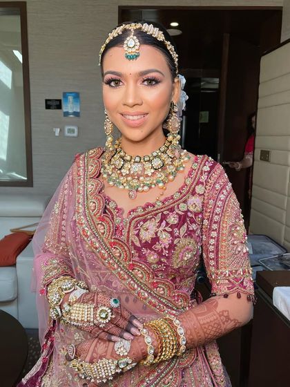 The bride looks absolutely stunning, a picture of grace and elegance.
