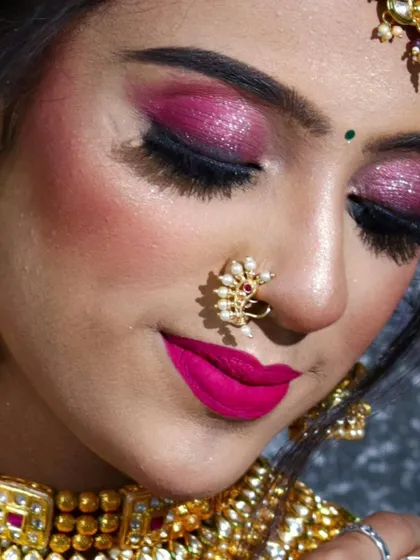 Another angle of the pink glittery eye, showing the flawless blending and the impact of the look.