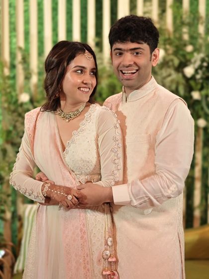 A joyful, candid portrait of the newly engaged couple, their smiles telling the whole story.