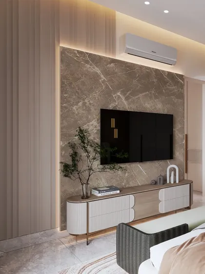 The TV wall in this bedroom features a marble slab and a sleek, modern console, blending natural materials with contemporary design.