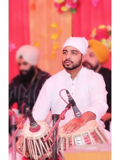 Performing Kirtan on the holy occasion of Gurupurab.