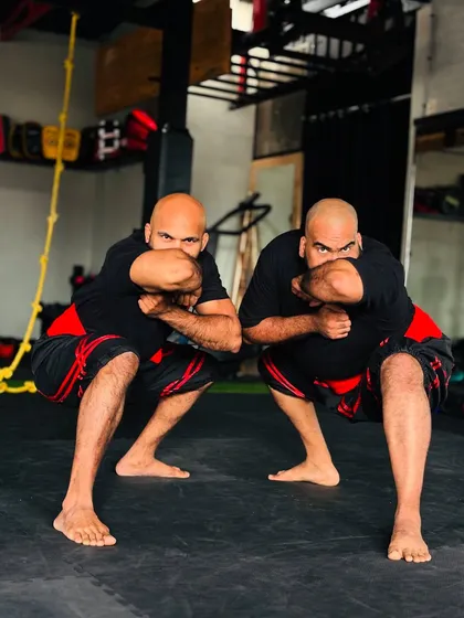 Synchronicity and discipline in action. We lead by example, demonstrating the focus and power that comes from dedicated Kalaripayattu practice. This is the level of precision we expect and cultivate in all our students.