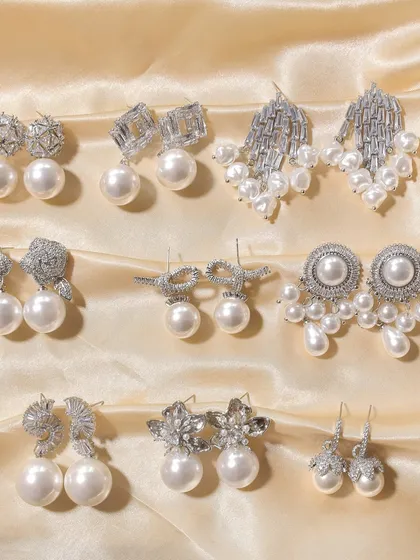 Pick your favorite pearls. This image shows a variety of my statement pearl earrings, perfect for adding a touch of elegance to any outfit.