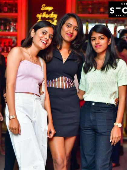 The stylish crowd at Secret Story, enjoying the ambiance of the bar and kitchen.