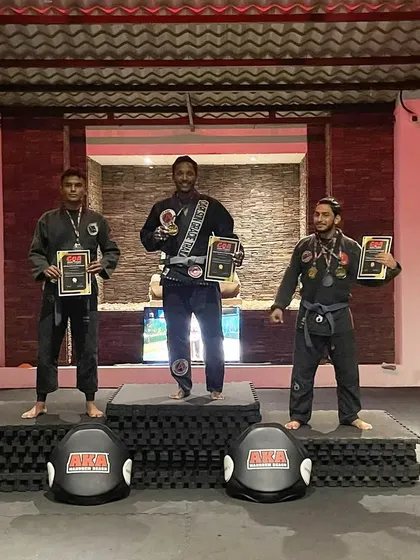 Our senior coach and BJJ blue belt, Lionel Mascarenhas, on the top of the podium after winning gold. This demonstrates the high level of expertise within our coaching staff.