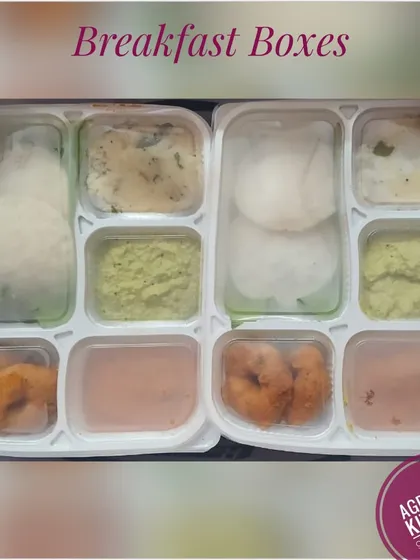 These are my convenient breakfast boxes, prepared for a corporate event. Each sealed tray contains a complete South Indian breakfast of idli, vada, upma, and chutneys, making it easy to distribute and enjoy.