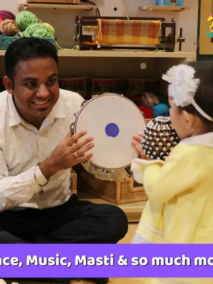 A father and his toddler enjoying music time. These sessions are full of dance, music, and masti for our youngest visitors.