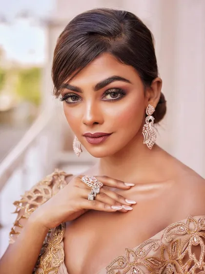 This close-up from a portfolio shoot shows a full glam look perfect for evening events or cocktail parties. I focused on creating a dramatic smokey eye, sculpted features, and a complementary matte lip for a high-fashion, editorial result.
