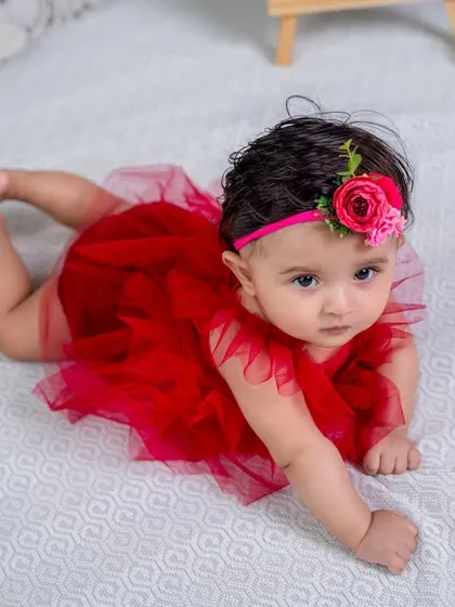 A sweet, curious gaze from the star of the show during her six-month milestone session.