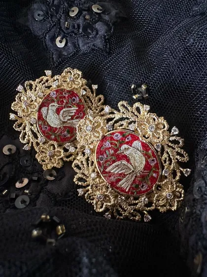 Doves are a symbol of hope, peace, and everlasting love. My "Forever Dlove" eartops feature micromosaic doves on a rich red background, framed by an intricate 18k gold lace border and natural diamonds.