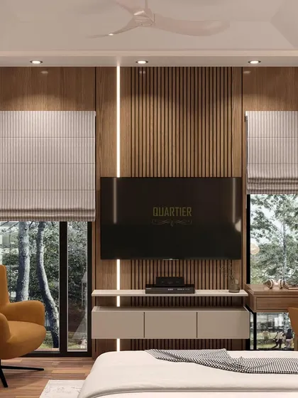 A master bedroom design featuring complete wooden paneling with intricate grooves and symmetrical profile lighting. The space includes an integrated TV unit and workstation, creating a warm and sophisticated retreat.