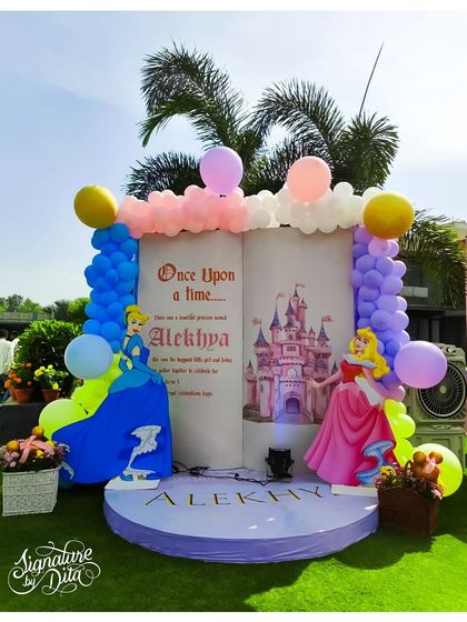 A different angle of the 'Once Upon a Time' storybook prop, showing how it serves as a beautiful backdrop for photos.
