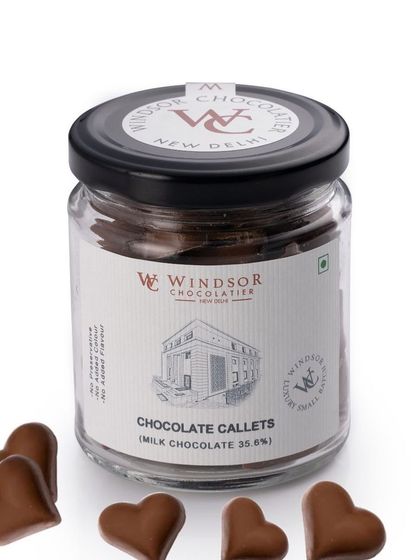 If you are in a bad mood, try our small milk chocolate hearts. These callets are made from our 35.6% milk chocolate and are a staple in our factory for creating various confections.