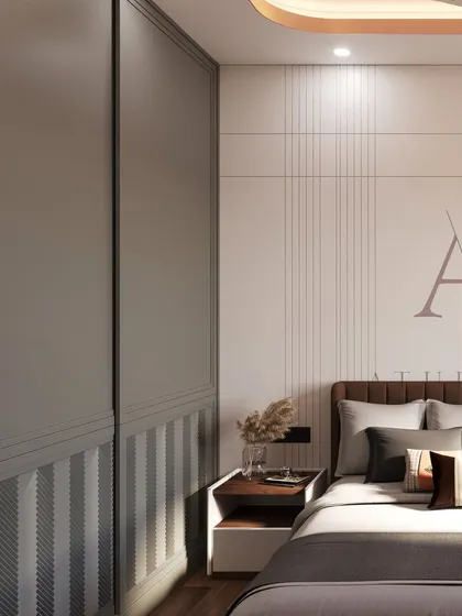 This bedroom features a minimalist design with clean lines, a two-tone wardrobe, and a simple yet elegant bedside setup.