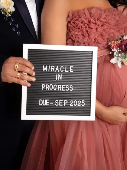 "Miracle in Progress." This close-up on the announcement board is a simple yet powerful way to share the exciting news.