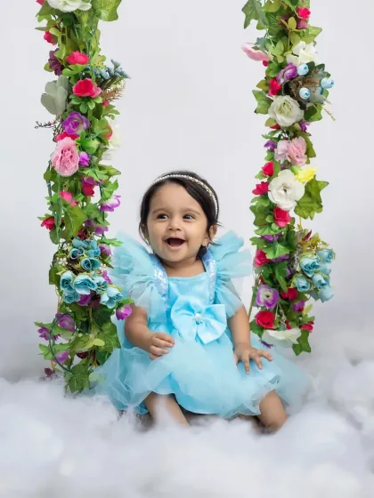 A big, happy laugh from the one-year-old birthday girl. These are the moments of pure joy I love to capture.