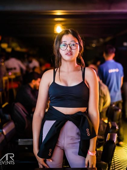 A guest posing at the bar.