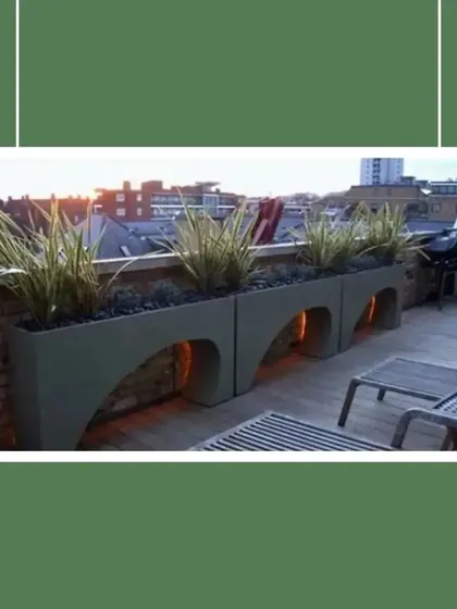 These arched planters are designed to make a statement, especially on a city terrace with a view. The open space underneath can be used for subtle uplighting, creating a beautiful silhouette against the evening sky.