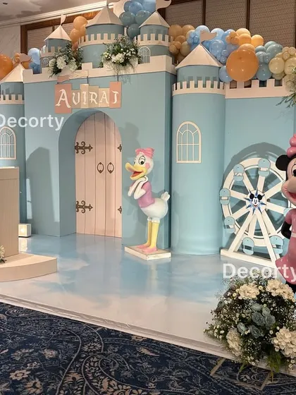 A clear, well-lit photo of the castle stage, showing the beautiful pastel color palette and character arrangement.