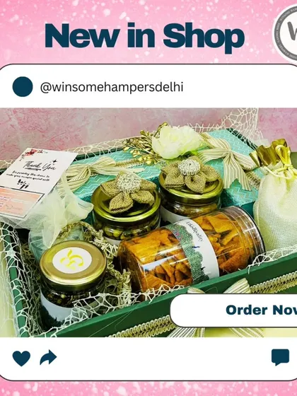 A new arrival in my shop, this hamper is presented in a green woven tray. It contains jars of savory snacks and other treats, decorated with burlap flowers and a thank you card, ready for any special occasion.