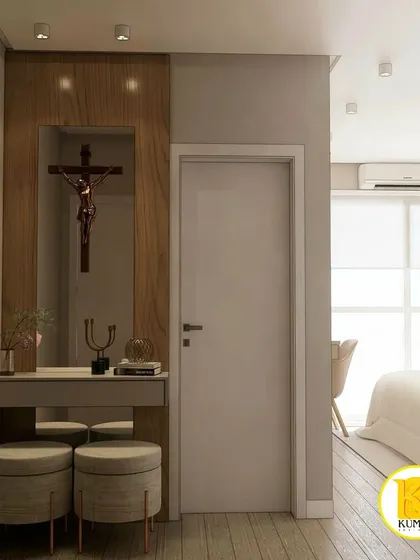 A close-up of the prayer and dressing nook, featuring a wooden cross and a compact vanity with poufs.