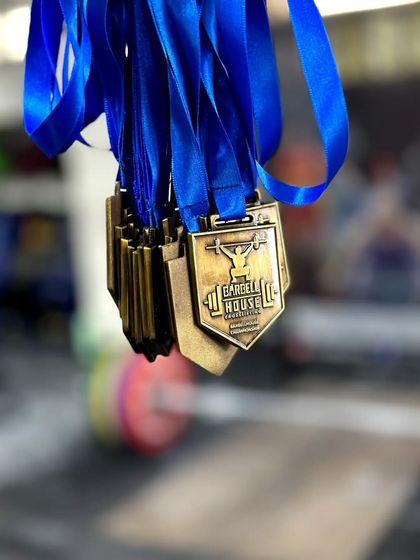 The custom medals for our 2023 Barbellhouse Weightlifting Championship. We believe in celebrating the achievements of every participant.