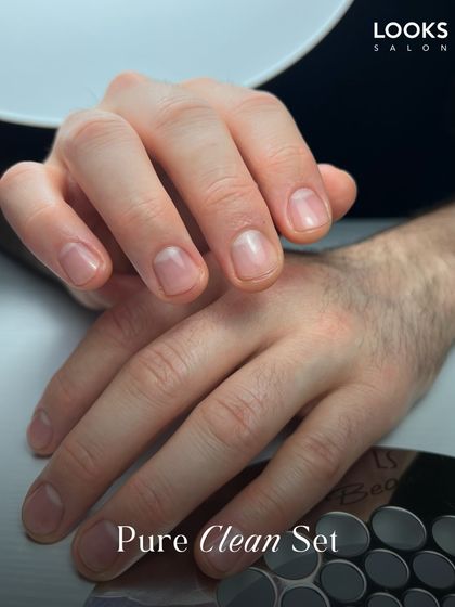For a clean and understated look, I offer the 'Pure Clean Set'. This service focuses on meticulous cuticle care, shaping, and buffing for healthy, well-groomed nails without any polish.